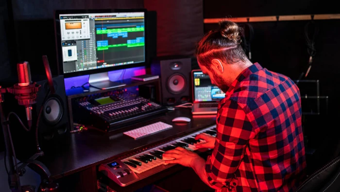 music producer enjoying his creative space