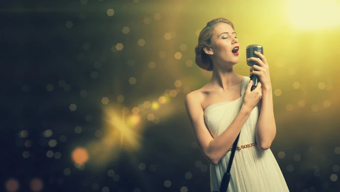 woman singing with old mic