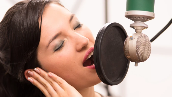 girl singing at home studio