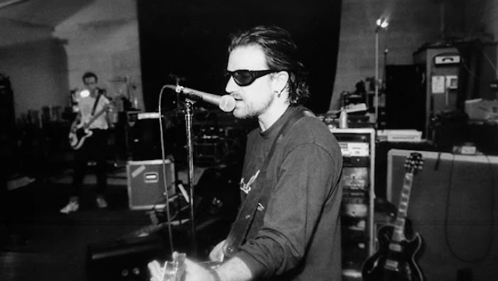 bono vox of U2 with a SM58